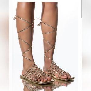NIB Gold Metallic Gladiator Vegan Faux Leather Wrap Up Strappy Flat Sandal 8
